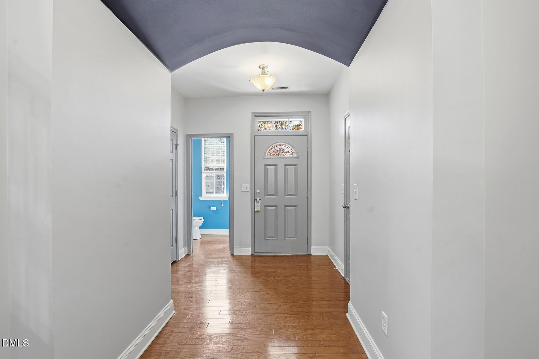 520 Camden Yards Way Cary, NC 27519 - Photo 5 of 30 a view of a hallway with wooden floor