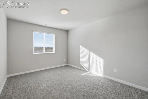 an empty room with a window