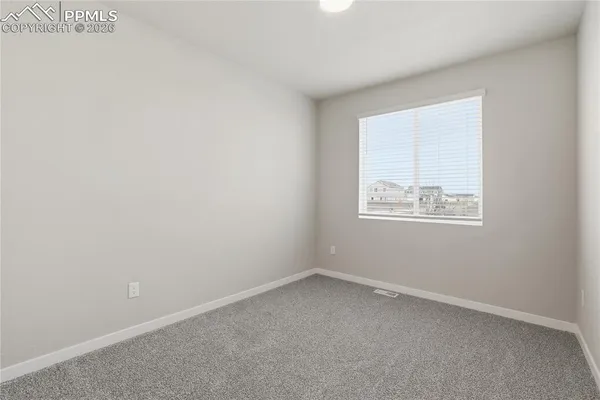 an empty room with a window