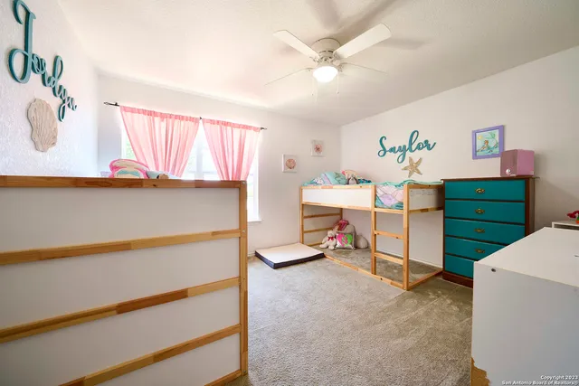 a view of yard with green space and seating area