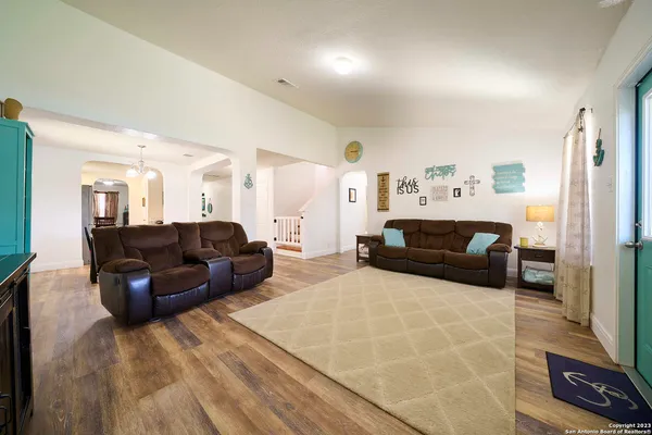 a living room with furniture and a couch