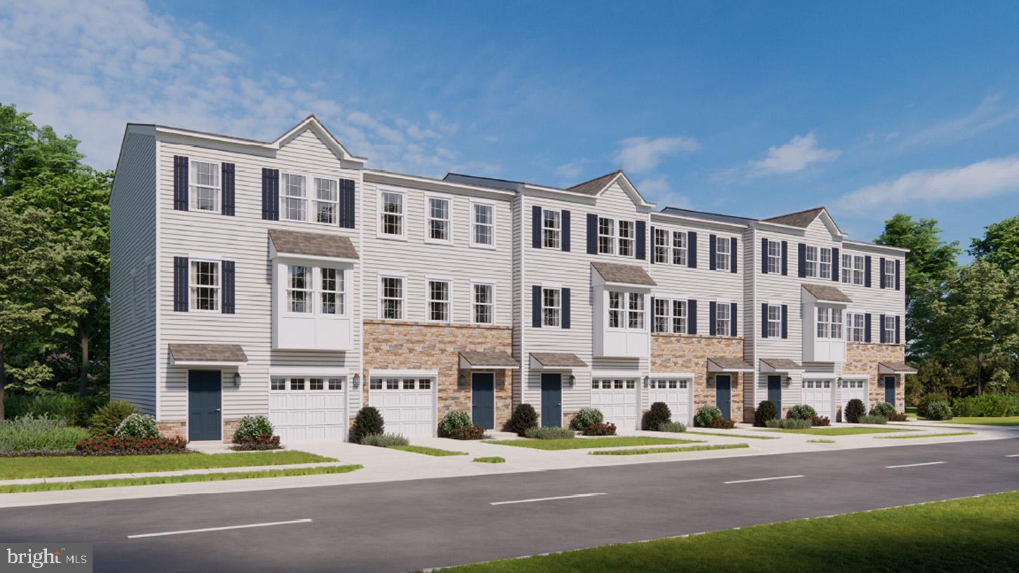 3080 Martha Way Pennsburg, PA 18073 - Photo 1 of 24 a front view of a building with lot of cars parked on road