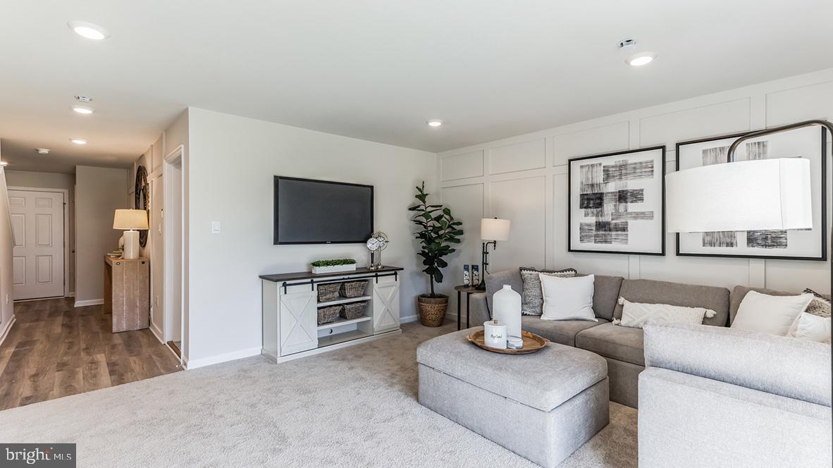3080 Martha Way Pennsburg, PA 18073 - Photo 15 of 24 a living room with furniture and a flat screen tv