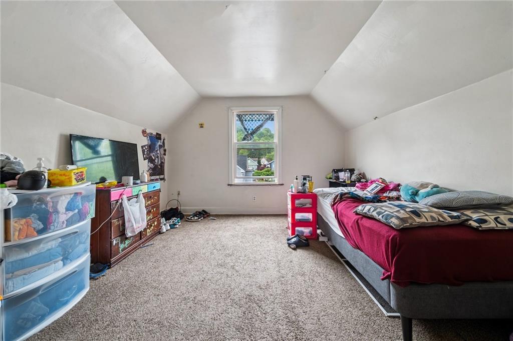 425 Agatha Street Pitcairn, PA 15140 - Photo 21 of 34 a bedroom with bed and a window