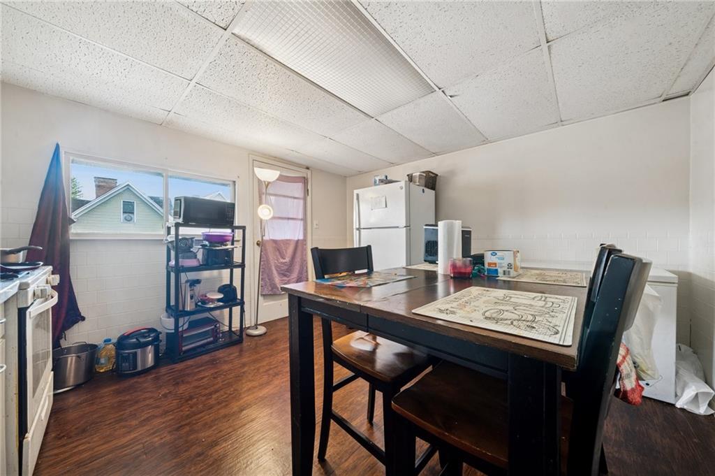 425 Agatha Street Pitcairn, PA 15140 - Photo 9 of 34 a view of a dining room with furniture and wooden floor