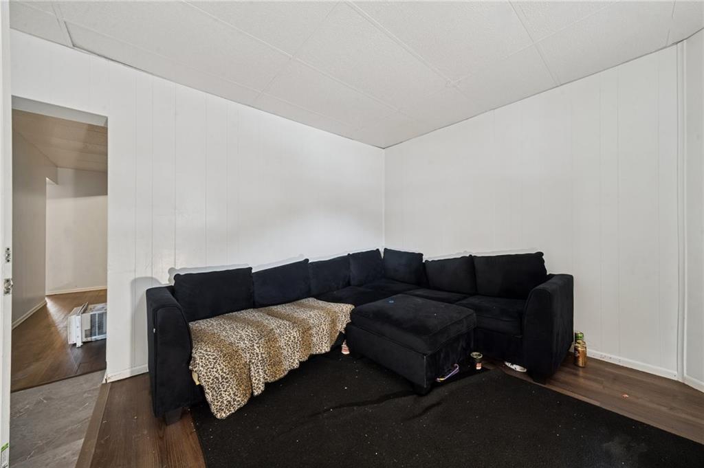 425 Agatha Street Pitcairn, PA 15140 - Photo 10 of 34 a living room with furniture and wooden floor