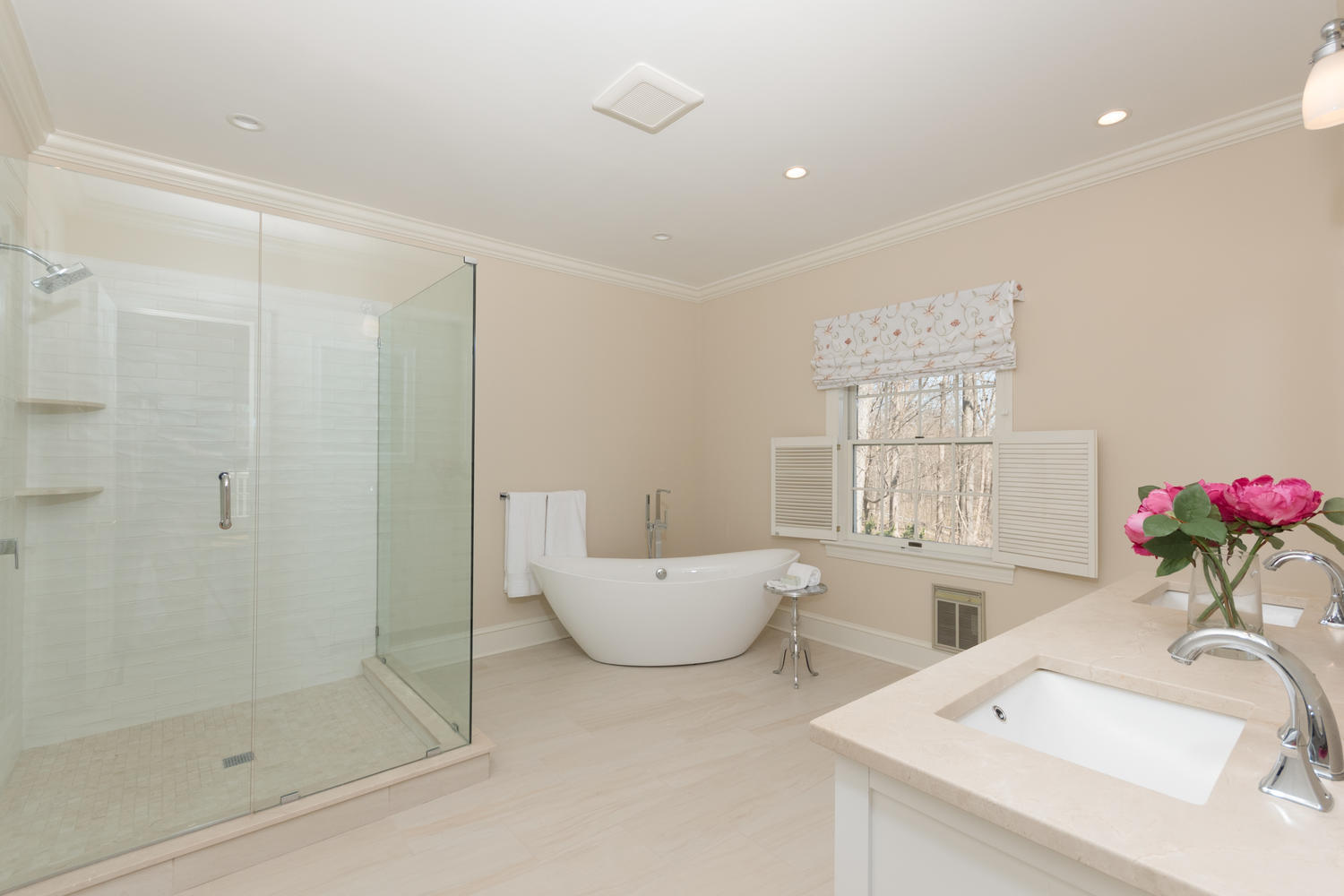 123 Lone Tree Farm Road New Canaan, CT 06840 - Photo 18 of 22 a bathroom with a tub sink mirror and a shower