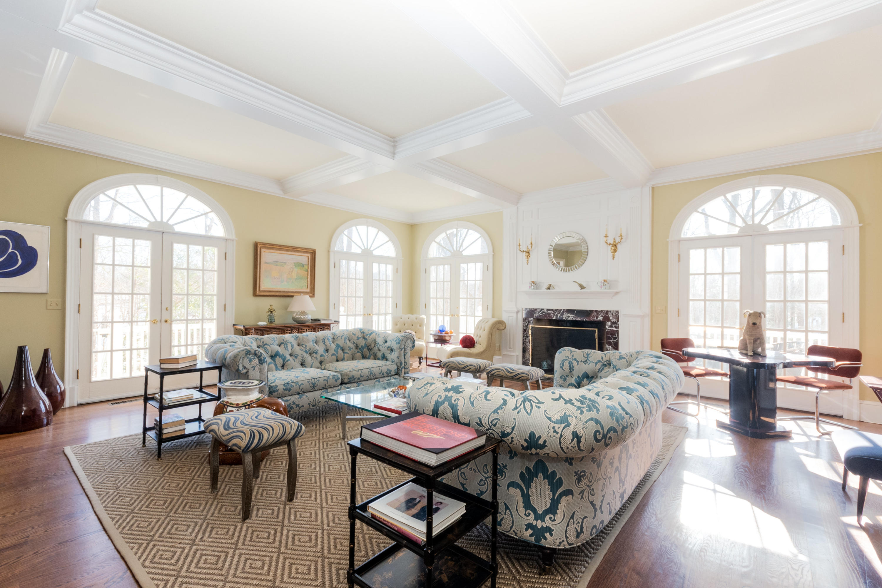 123 Lone Tree Farm Road New Canaan, CT 06840 - Photo 5 of 22 a living room with furniture a fireplace and a large window