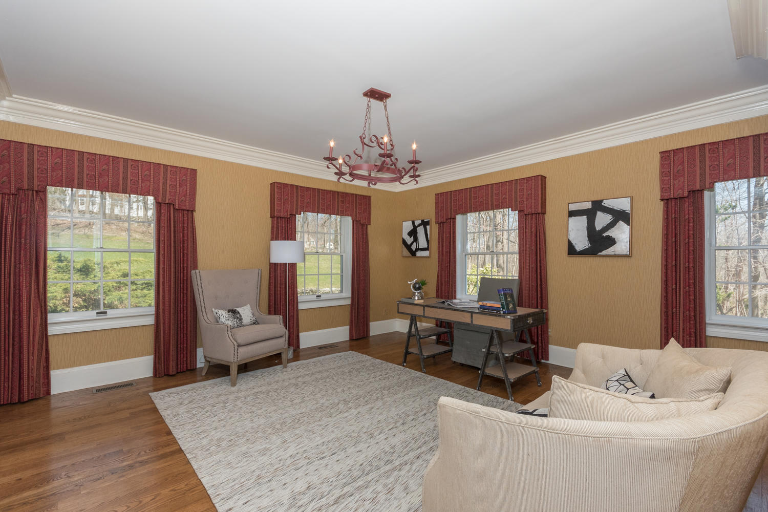 123 Lone Tree Farm Road New Canaan, CT 06840 - Photo 8 of 22 a living room with furniture and a chandelier