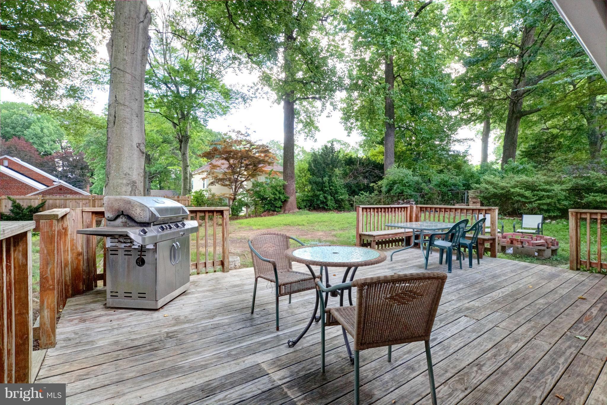 5400 Ferndale Street Springfield, VA 22151 - Photo 22 of 29 a view of a dinning table and chairs on the deck