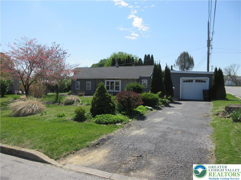 246 Poplar Street Bath, PA 18014 - Photo 3 of 20 a front view of a house with garden