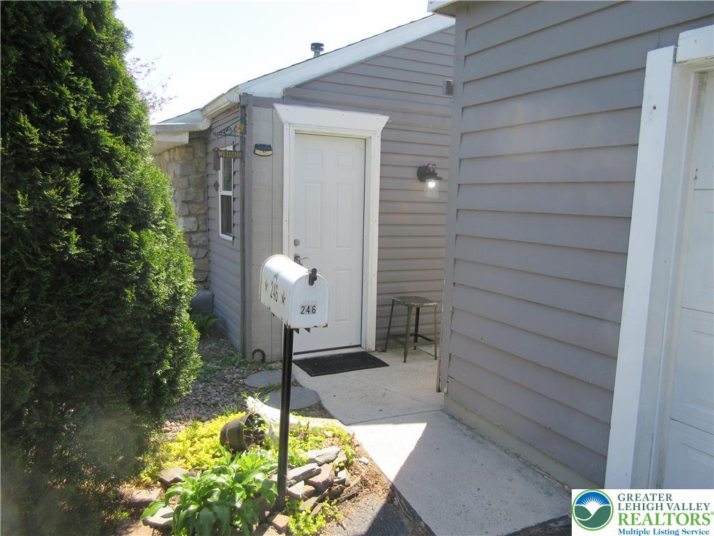 246 Poplar Street Bath, PA 18014 - Photo 7 of 20 a front view of a house with a yard