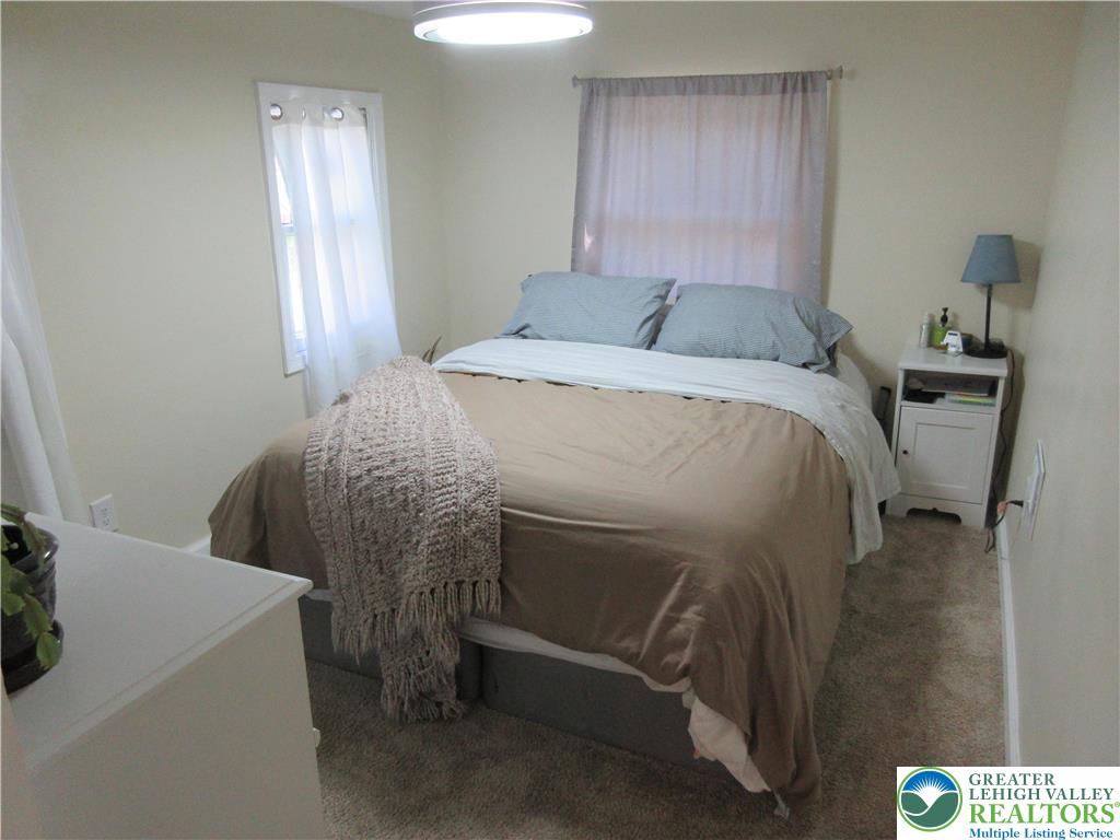 246 Poplar Street Bath, PA 18014 - Photo 10 of 20 a bedroom with a bed and a window