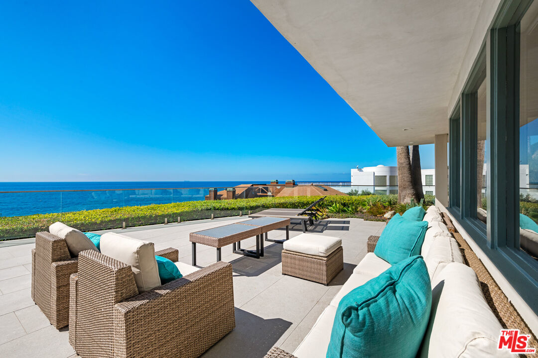 32054 Pacific Coast Highway Malibu, CA 90265 - Photo 2 of 48 a view of swimming pool with outdoor seating and a patio