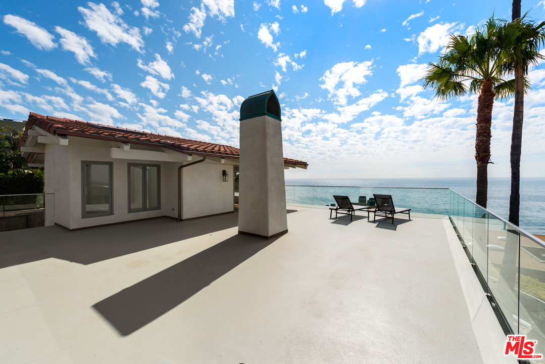32054 Pacific Coast Highway Malibu, CA 90265 - Photo 26 of 48 a view of a terrace with chairs