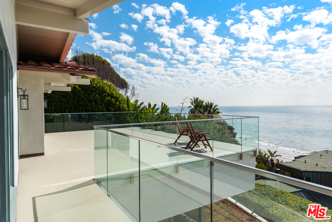 32054 Pacific Coast Highway Malibu, CA 90265 - Photo 28 of 48 a view of a balcony with chairs
