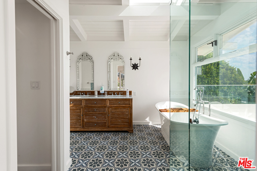 32054 Pacific Coast Highway Malibu, CA 90265 - Photo 31 of 48 a room with glass door and furniture