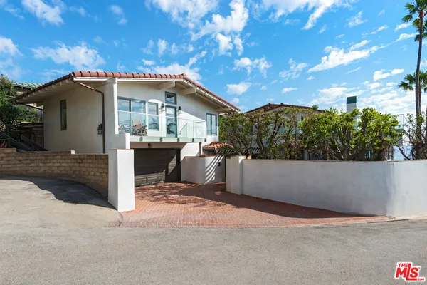 a view of a house with a patio
