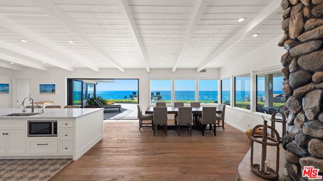 a large room with lots of table and chairs