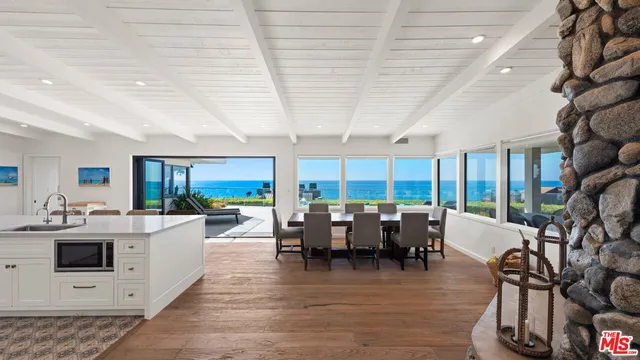 a large room with lots of table and chairs