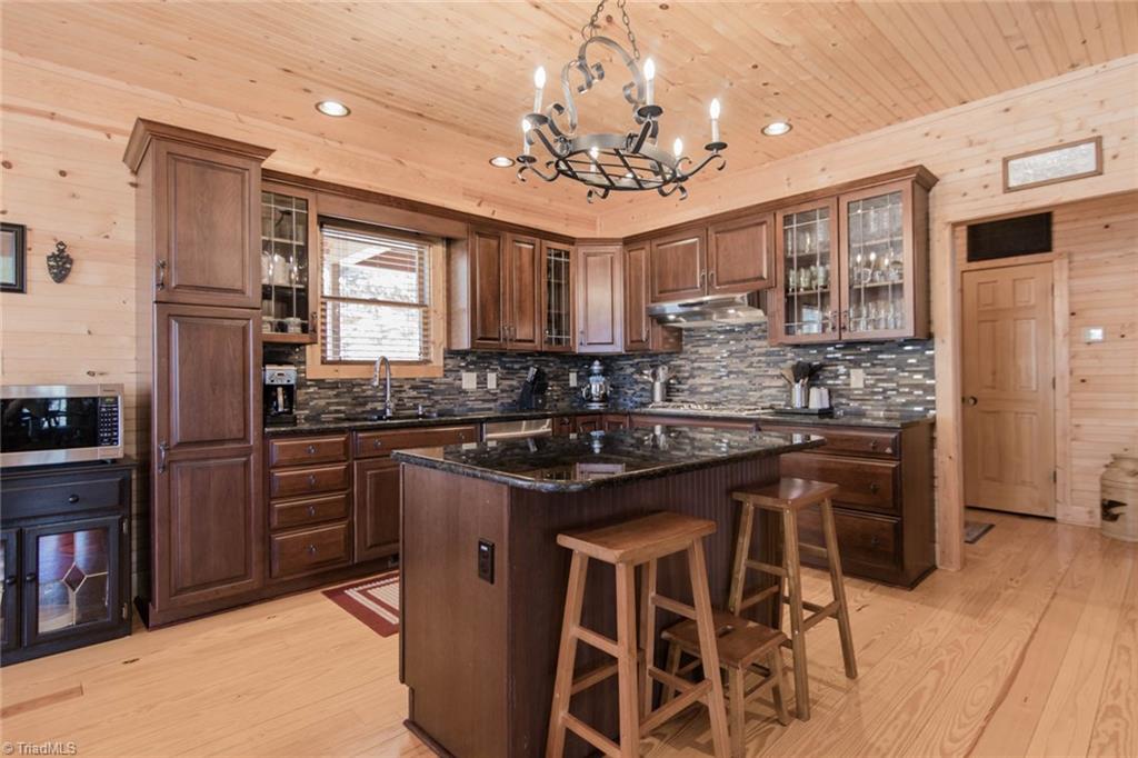 308 Warren Way Purlear, NC 28665 - Photo 14 of 29 Large Kitchen with gas cooktop, granite counters, and soft close drawers.