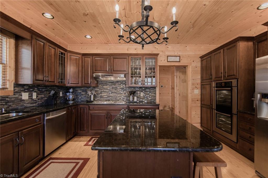 308 Warren Way Purlear, NC 28665 - Photo 16 of 29 Gas cooktop, double oven, stainless appliances...This Kitchen has it all!