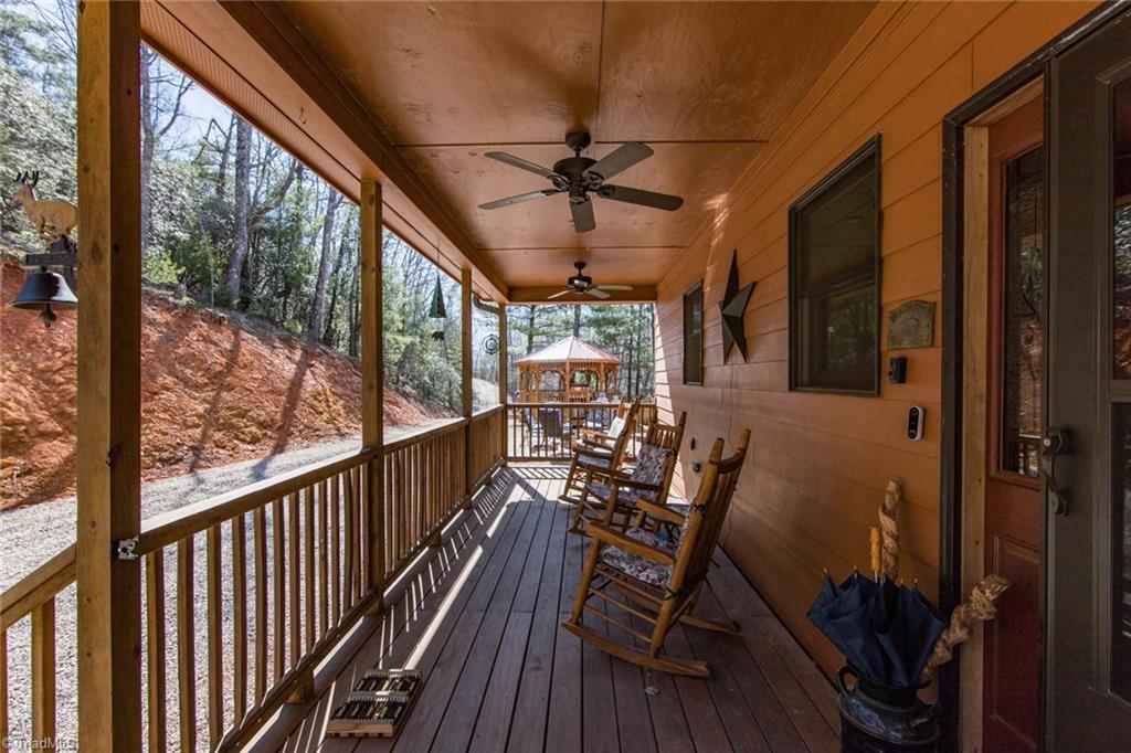 308 Warren Way Purlear, NC 28665 - Photo 3 of 29 Sit and relax on this welcoming front porch.