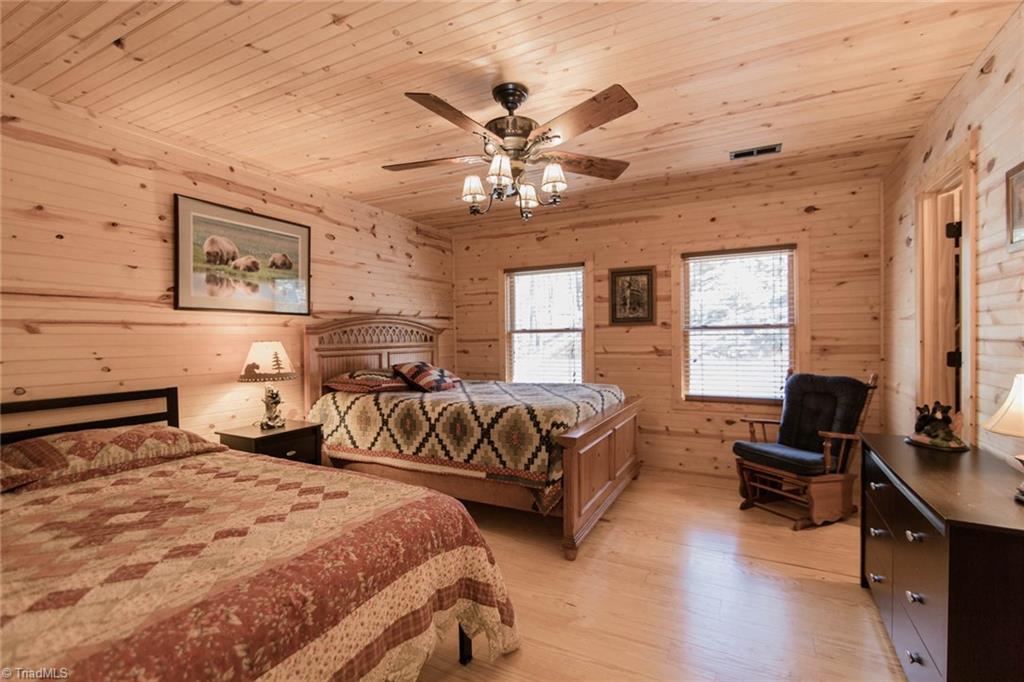 308 Warren Way Purlear, NC 28665 - Photo 23 of 29 Owners call this "The Queen Room" because there are TWO queen beds in this room. It also has a huge walk-in closet!