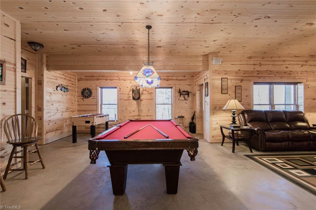 308 Warren Way Purlear, NC 28665 - Photo 25 of 29 There is a Workshop/Storage Room off the Game Room through the door on the left.