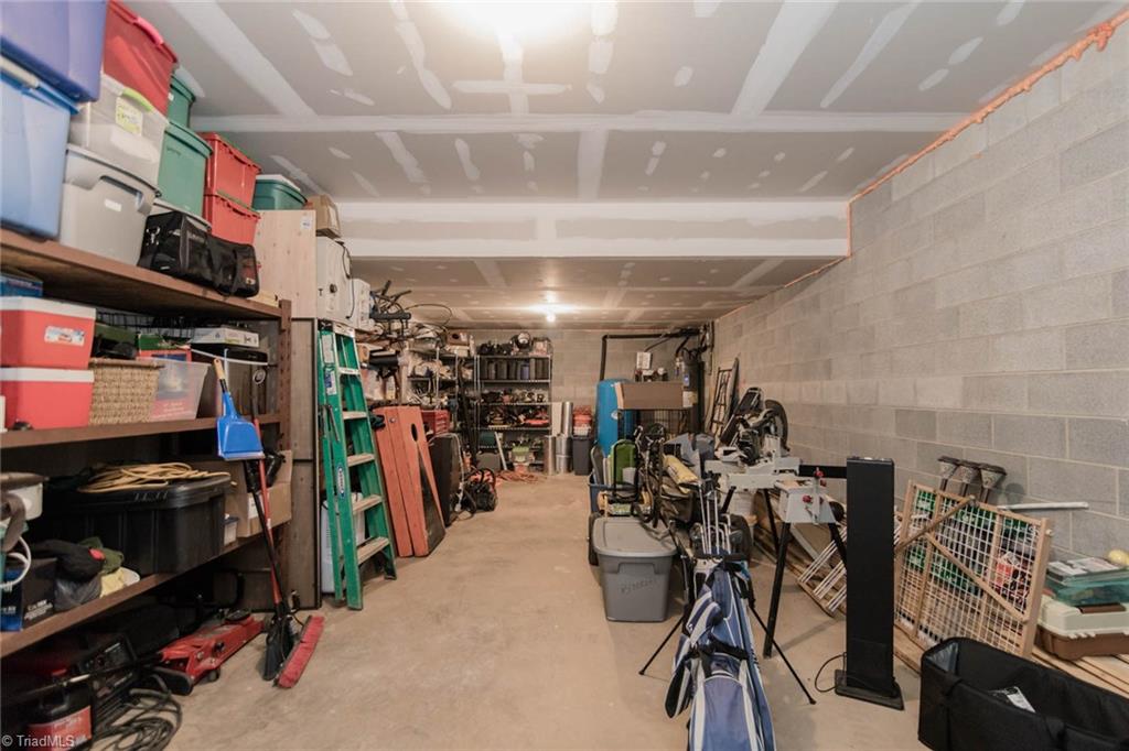 308 Warren Way Purlear, NC 28665 - Photo 29 of 29 Workshop/Storage Room off the Game Room has a double door, so it can also be used for ATV storage.