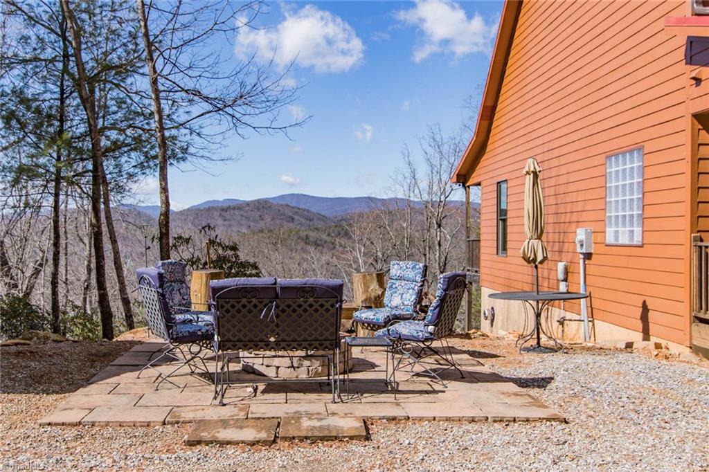 308 Warren Way Purlear, NC 28665 - Photo 5 of 29 Enjoy the fire pit and the beautiful mountain views!