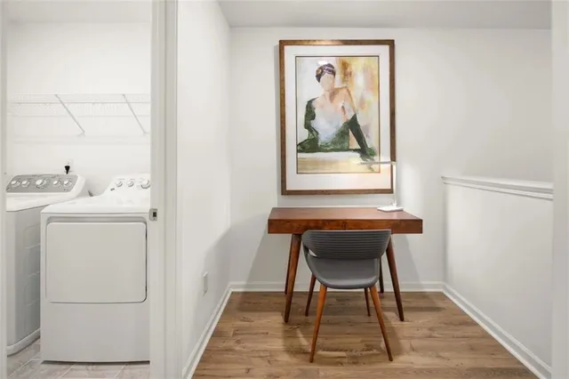 a workspace with furniture and a window