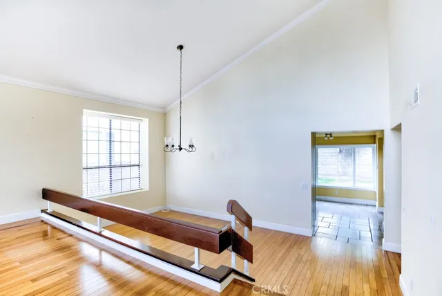 a living room with a bed furniture and a window