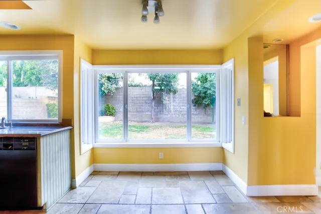 a view of a bathroom with a tub and sink