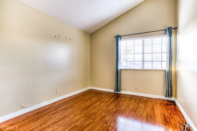 a view of bathroom with wooden floor