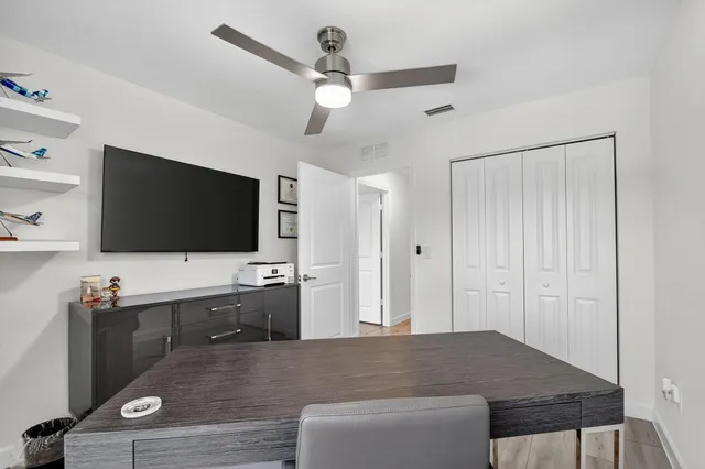 a view of a workspace with furniture