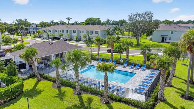 an aerial view of a house with a garden and plants