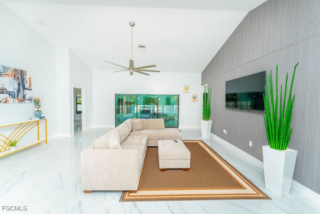 3613 39th Street Southwest Lehigh Acres, FL 33976 - Photo 14 of 46 a view of living room with furniture and a large window
