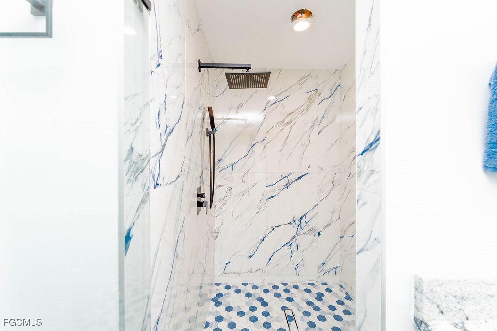 3613 39th Street Southwest Lehigh Acres, FL 33976 - Photo 30 of 46 a bathroom with a shower