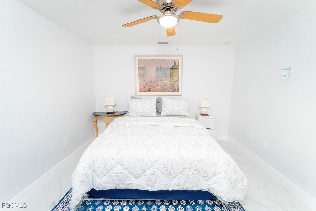 3613 39th Street Southwest Lehigh Acres, FL 33976 - Photo 32 of 46 a bathroom with a sink and a mirror