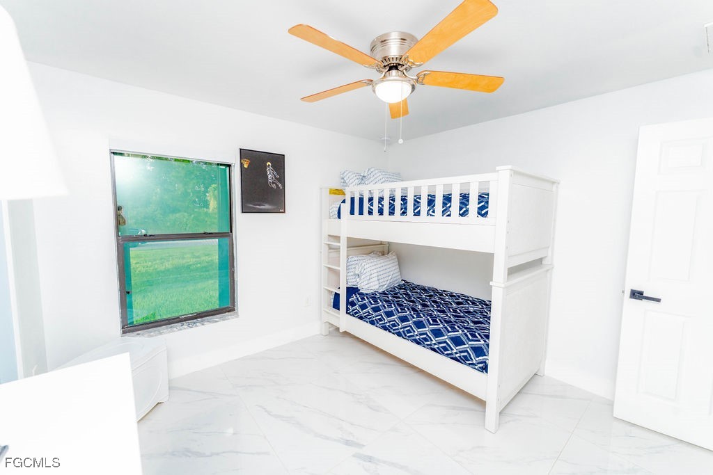 3613 39th Street Southwest Lehigh Acres, FL 33976 - Photo 34 of 46 a view of entryway with a front door