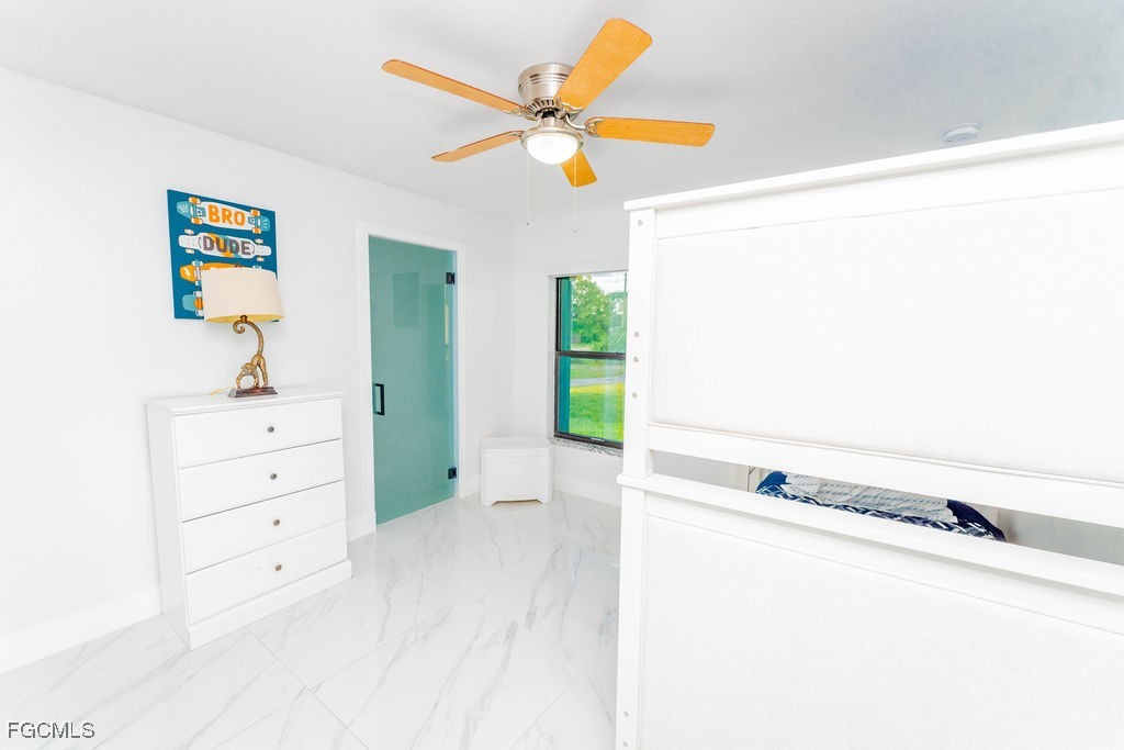 3613 39th Street Southwest Lehigh Acres, FL 33976 - Photo 36 of 46 a view of an empty room with a window