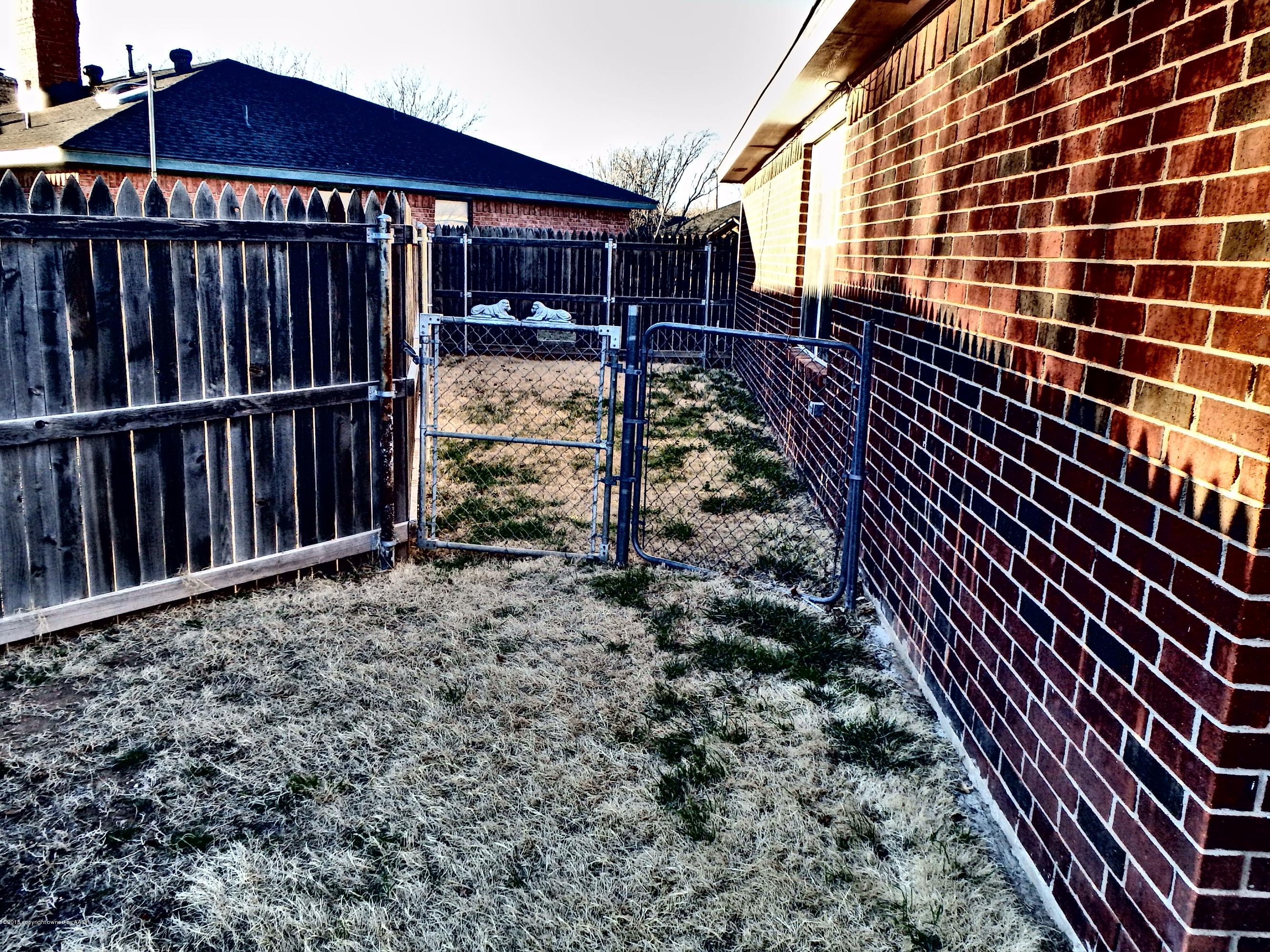 4203 Rincon Avenue Amarillo, TX 79110 - Photo 36 of 39 a view of a backyard with pathway