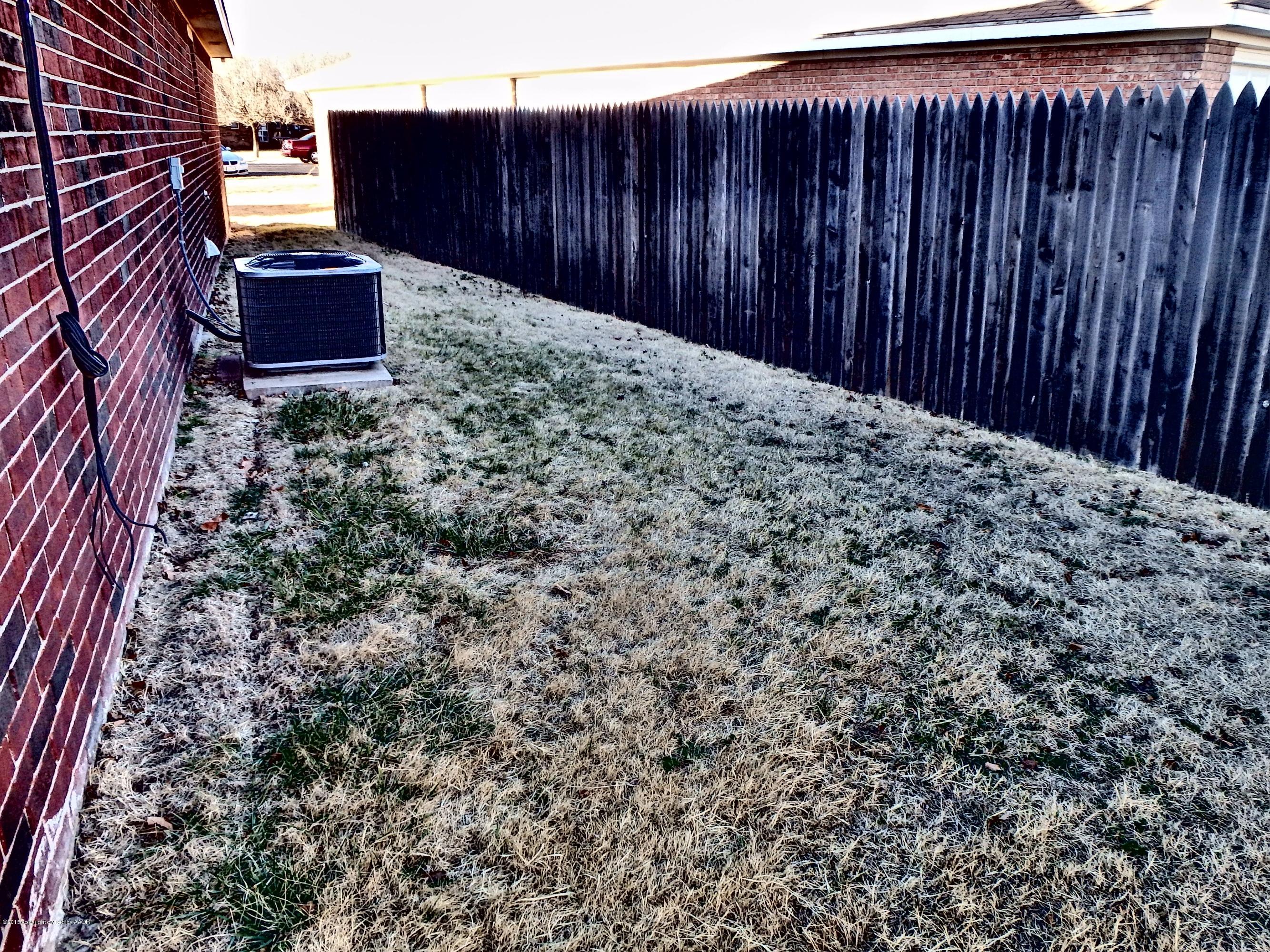 4203 Rincon Avenue Amarillo, TX 79110 - Photo 39 of 39 a view of a backyard with plants