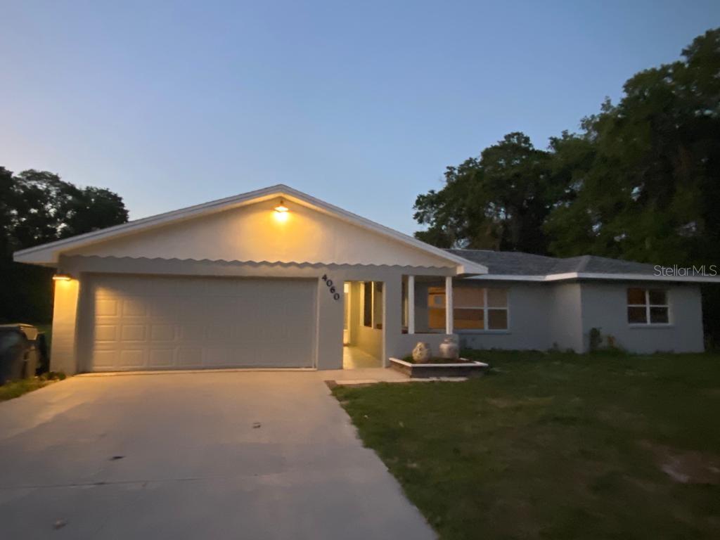 4060 East Park Avenue Lake Wales, FL 33855 - Photo 1 of 1 a front view of house with yard and green space