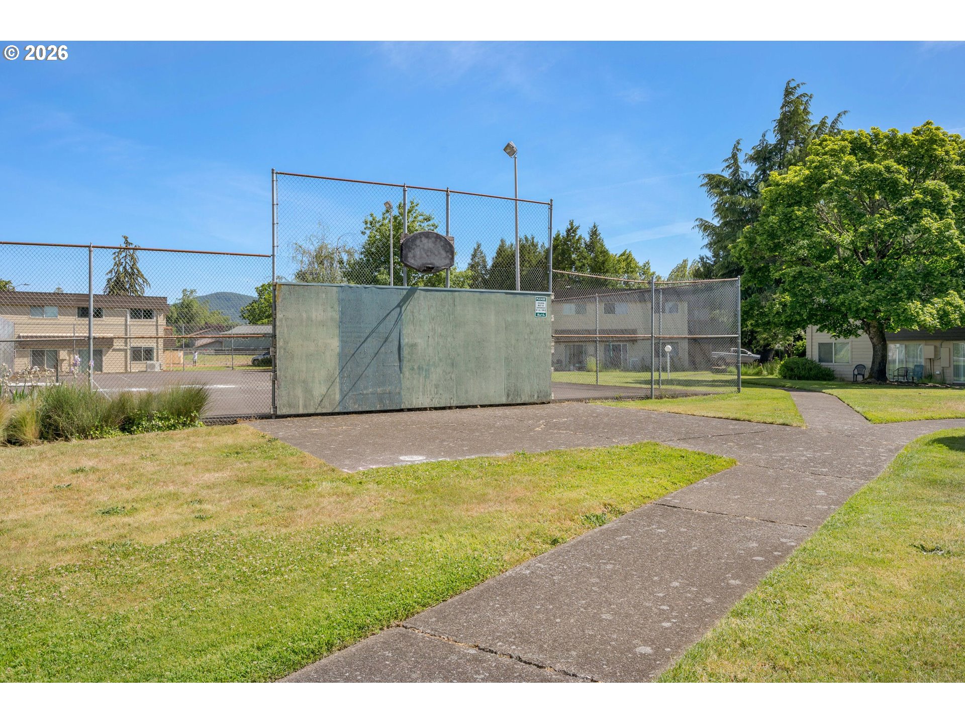2727 Gateway Street, Unit 18 Springfield, OR 97477 - Photo 33 of 34 a view of a swimming pool and lake