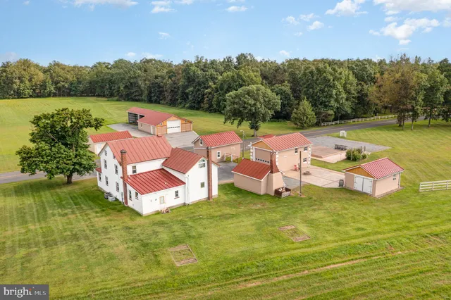 a view of a swimming pool with a yard