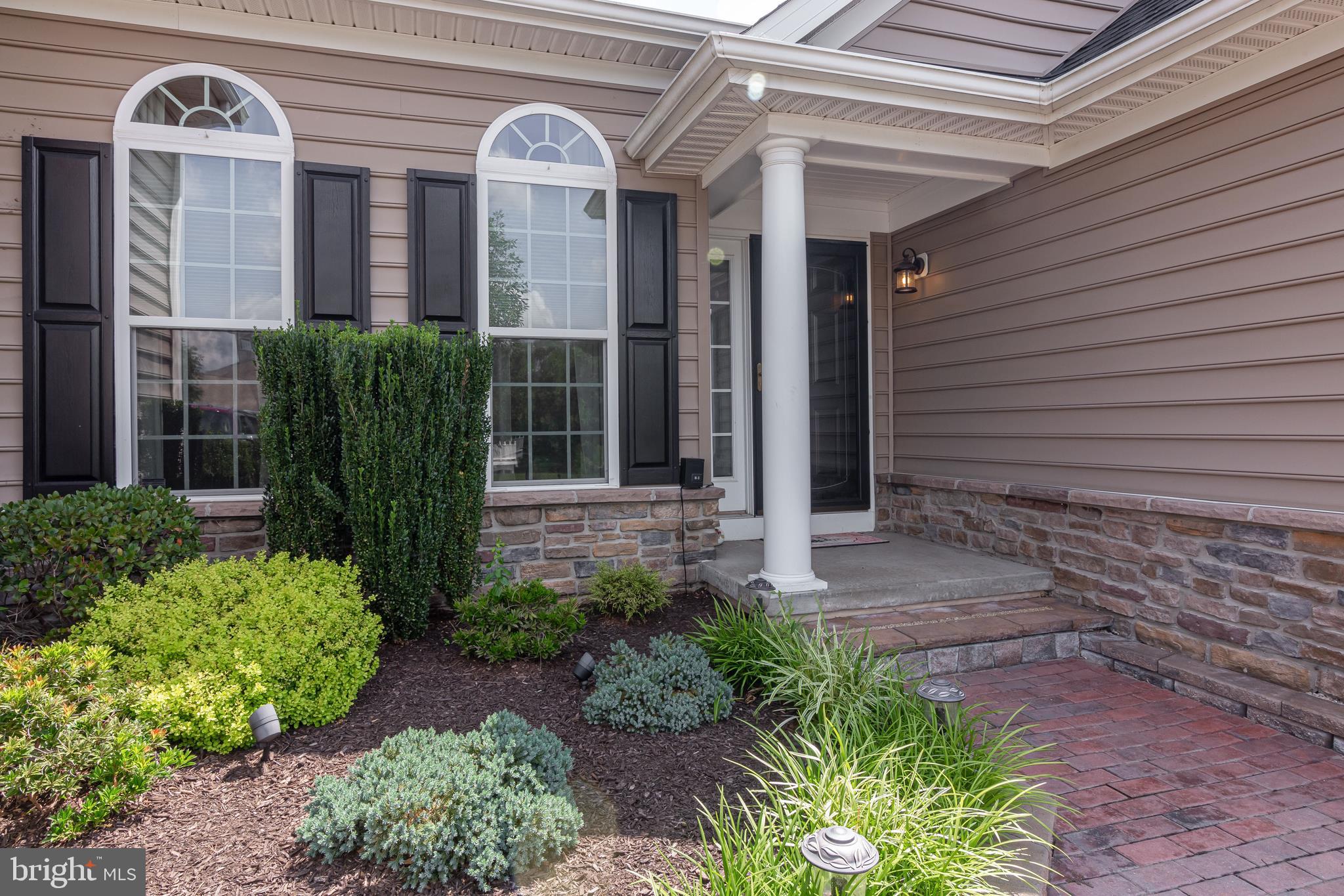 7 Strand Road Avondale, PA 19311 - Photo 3 of 39 Covered Entry with Brick Patio