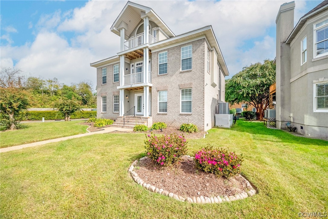 15 Brough Lane Hampton, VA 23669 - Photo 1 of 43 a front view of house with an outdoor space and seating