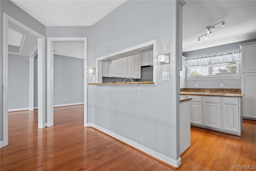 15 Brough Lane Hampton, VA 23669 - Photo 23 of 43 a view of a kitchen with wooden floor electronic appliances and windows